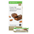 Protein Bar Deluxe Vanilla Almond flavor with packaging and bars displayed, a protein-based nutritional snack.